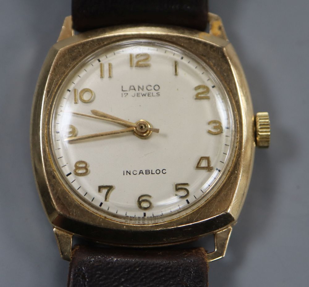 A gentlemans 1960s 9ct gold Lanco manual wind wrist watch, on leather strap.